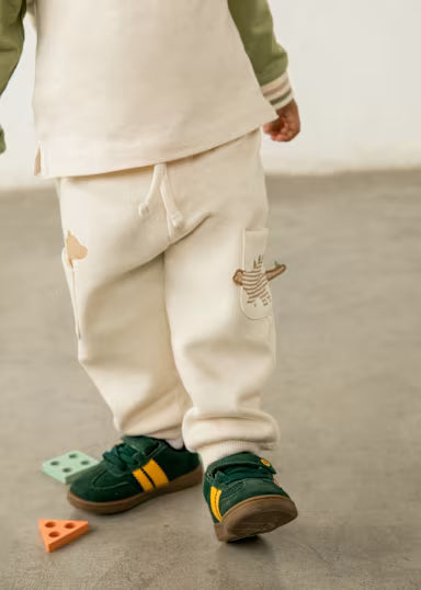 PANTALONE DINOSAURO IN FELPA CREMA
